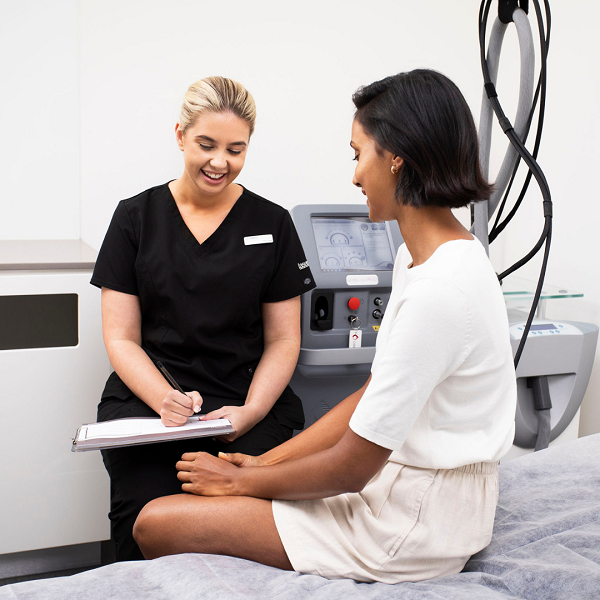 A patient and therapist in the laser clinic