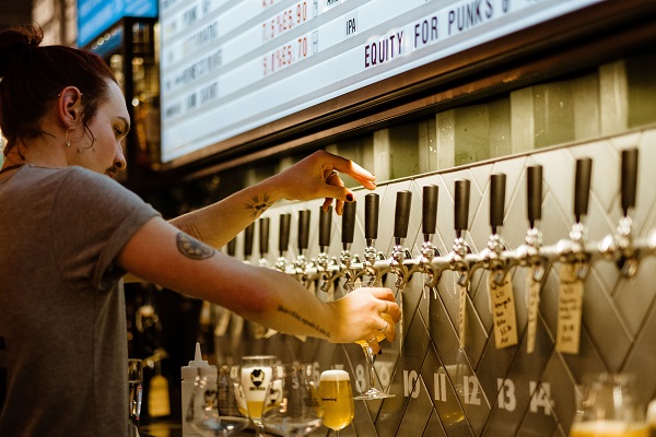 Barman pulling pints